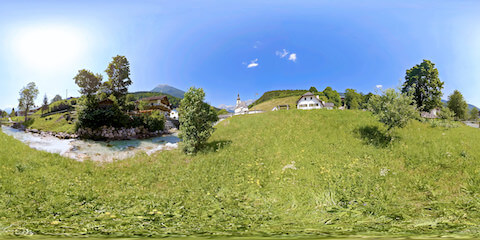 Alpine River Flowing Near Church
