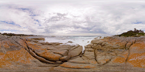 Rocky Headland With Red Rocks