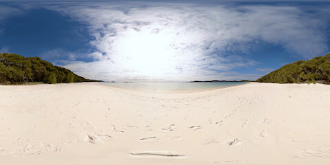 Remote Beach Footprints In The Sand