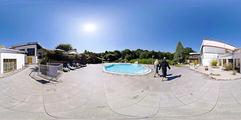 Sauna Park - Couple Walking Past Pool