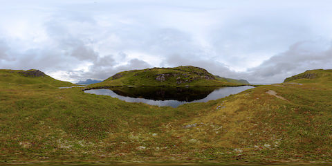 Cloudy Sky Over Mountain Lake