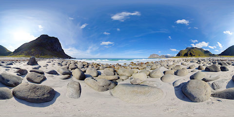 Large Stones On Nordic Beach In Mountain Landscape