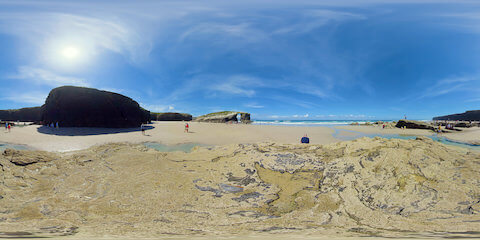 People Strolling Along Cathedral Beach