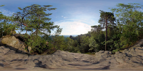 Sitting On Cliff Edge During Sunrise