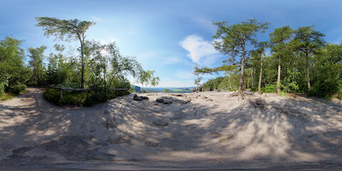 Tree-framed View Of Sandstone Mountains From Plateau