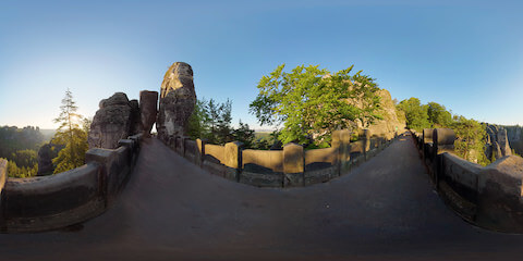 Looking Over Parapet Of Historic Stone Bridge