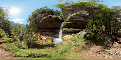 Forest Waterfall Plunges Into Turquoise Pool