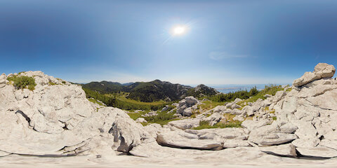 Forested Valley And Ocean View From Stony Mountaintop
