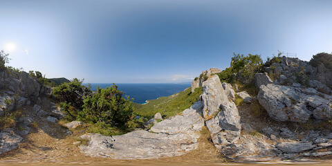 Ocean View In Rugged Landscape Near Historic Stone Village